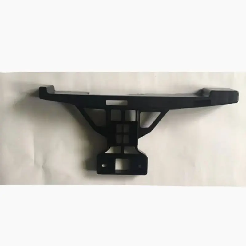 Suporte na seção média do para-choque dianteiro.