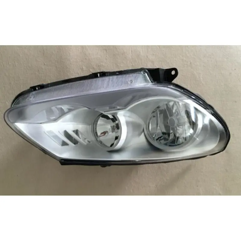 Faróis – ajuste manual.