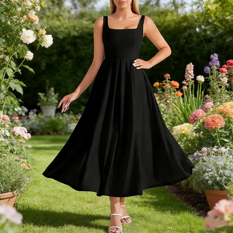 Les robes maxi à col carré sont à la mode : pourquoi ce style ajusté et évasé a l'air si élégant