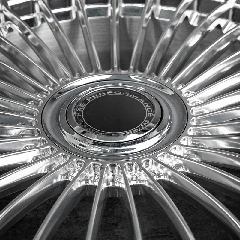 Fully polished one-piece forged custom aluminum alloy wheels with large floating center caps, available in 18-inch, 19-inch, 20-inch, and 21-inch sizes