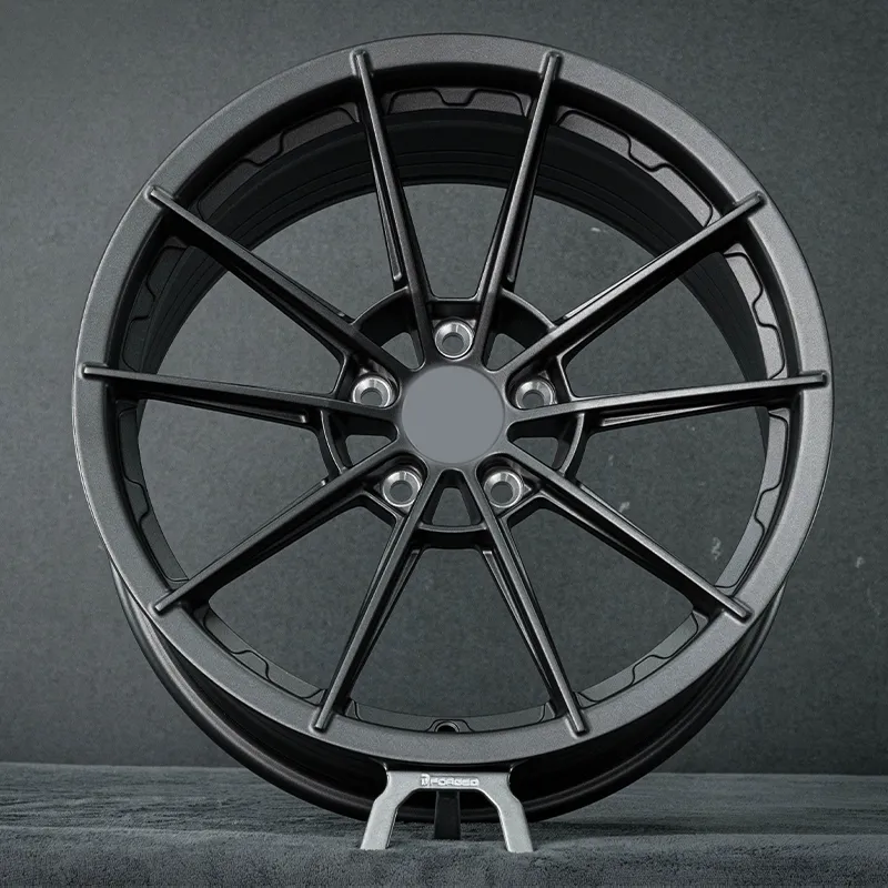 Forged wheels in full dark gunmetal gray, available in 17-inch, 18-inch, 19-inch, 20-inch, and 21-inch sizes, with bolt patterns 5x100, 5x105, 5x108, 5x110, 5x112, 5x114.3, and 5x120 for passenger car alloy wheels