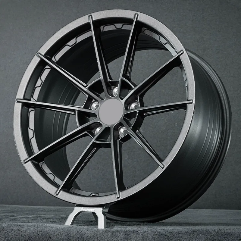 Forged wheels in full dark gunmetal gray, available in 17-inch, 18-inch, 19-inch, 20-inch, and 21-inch sizes, with bolt patterns 5x100, 5x105, 5x108, 5x110, 5x112, 5x114.3, and 5x120 for passenger car alloy wheels