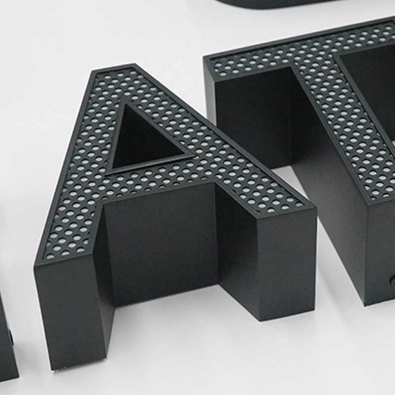 Perforated Brushed Black Stainless Steel Channel Letters | Front-Lit Point Signage