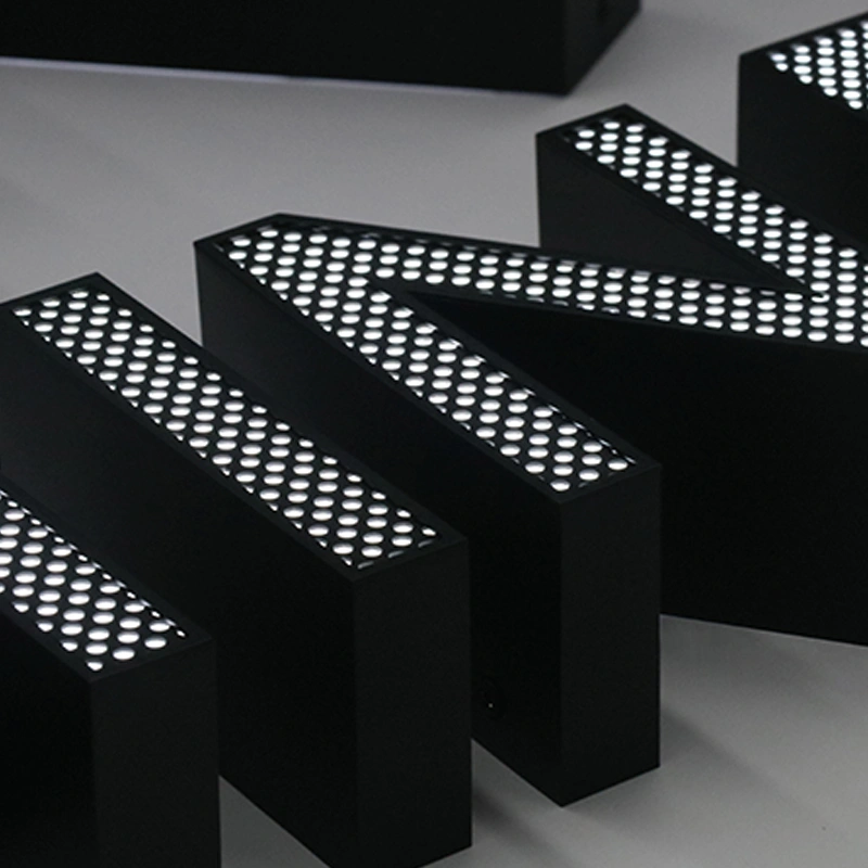Perforated Brushed Black Stainless Steel Channel Letters | Front-Lit Point Signage