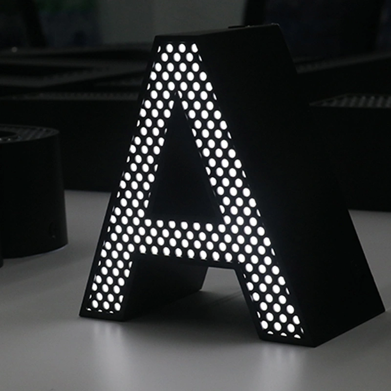 Perforated Brushed Black Stainless Steel Channel Letters | Front-Lit Point Signage