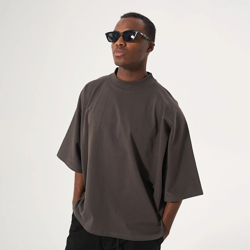 قميص رجالي جديد صيفي مخصص 100% قطن ثقيل 300 غرام مصنع مصنّع ملابس الشارتر الواقعة على الشارع تصميم واسع قصير والملابس الكبيرة الكبيرة النمط المواد الصلبة الأكمام النصفية