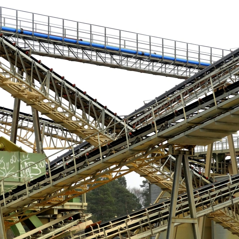 Rouleaux de galets d'impact en acier vs en caoutchouc : lequel est le meilleur pour les systèmes de convoyeurs de forte charge