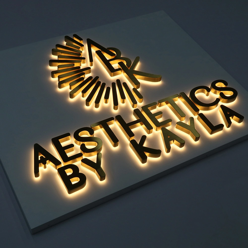 Elite Brushed Gold Titanium Halo-Lit Signs | Integrated Backplate LED Signage