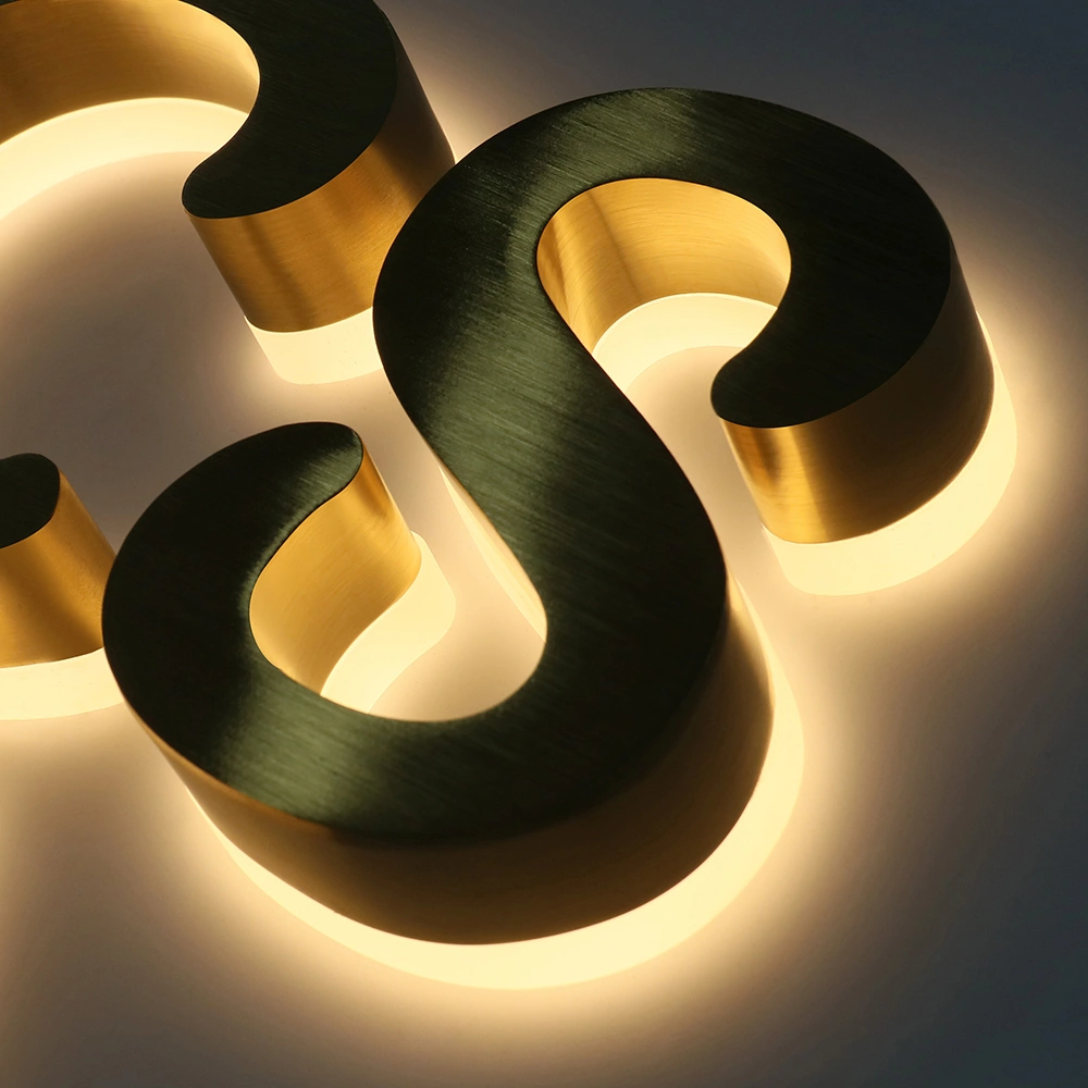 Elite Brushed Gold Titanium Halo-Lit Signs | Integrated Backplate LED Signage