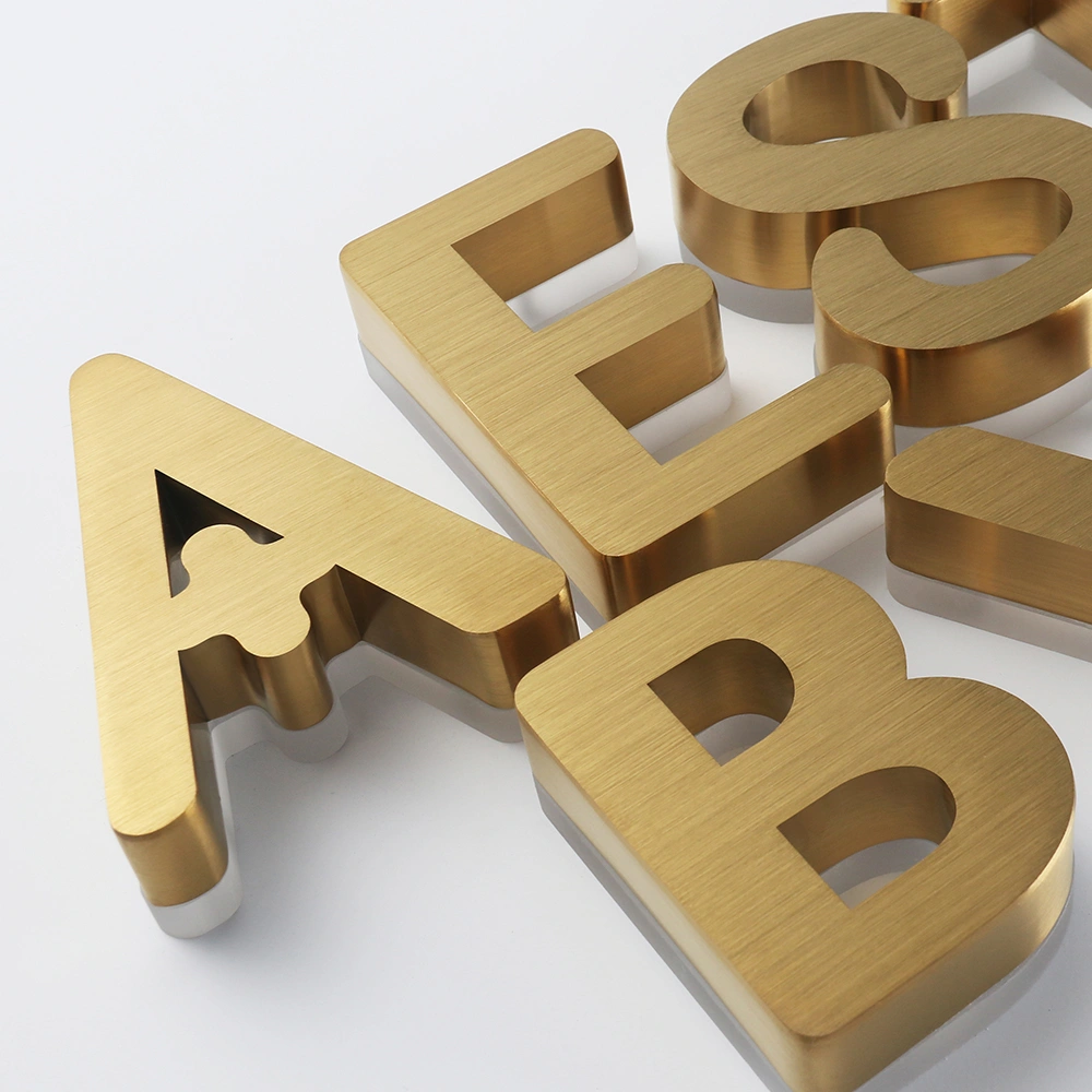 Elite Brushed Gold Titanium Halo-Lit Signs | Integrated Backplate LED Signage