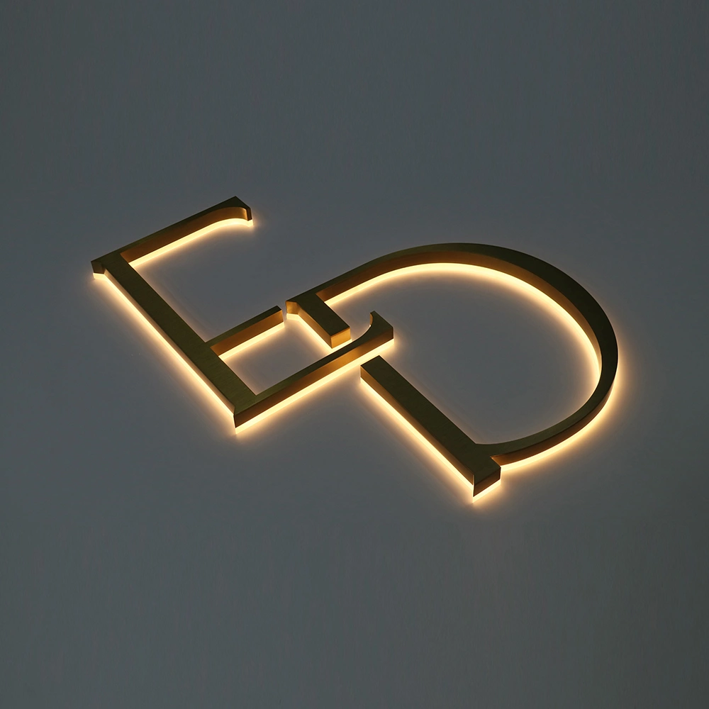 Elite Brushed Gold Titanium Halo-Lit Signs | Custom Architectural LED Signage