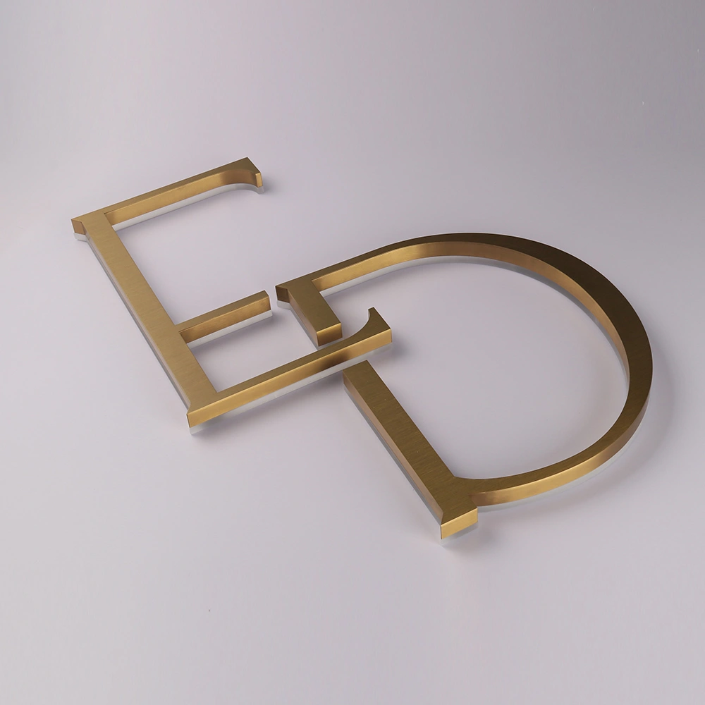Elite Brushed Gold Titanium Halo-Lit Signs | Custom Architectural LED Signage