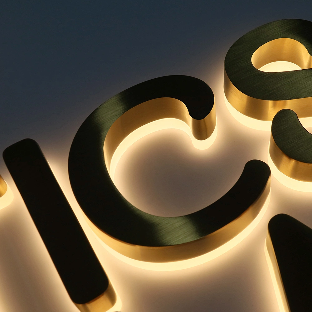 Elite Brushed Gold Titanium Halo-Lit Signs | Integrated Backplate LED Signage