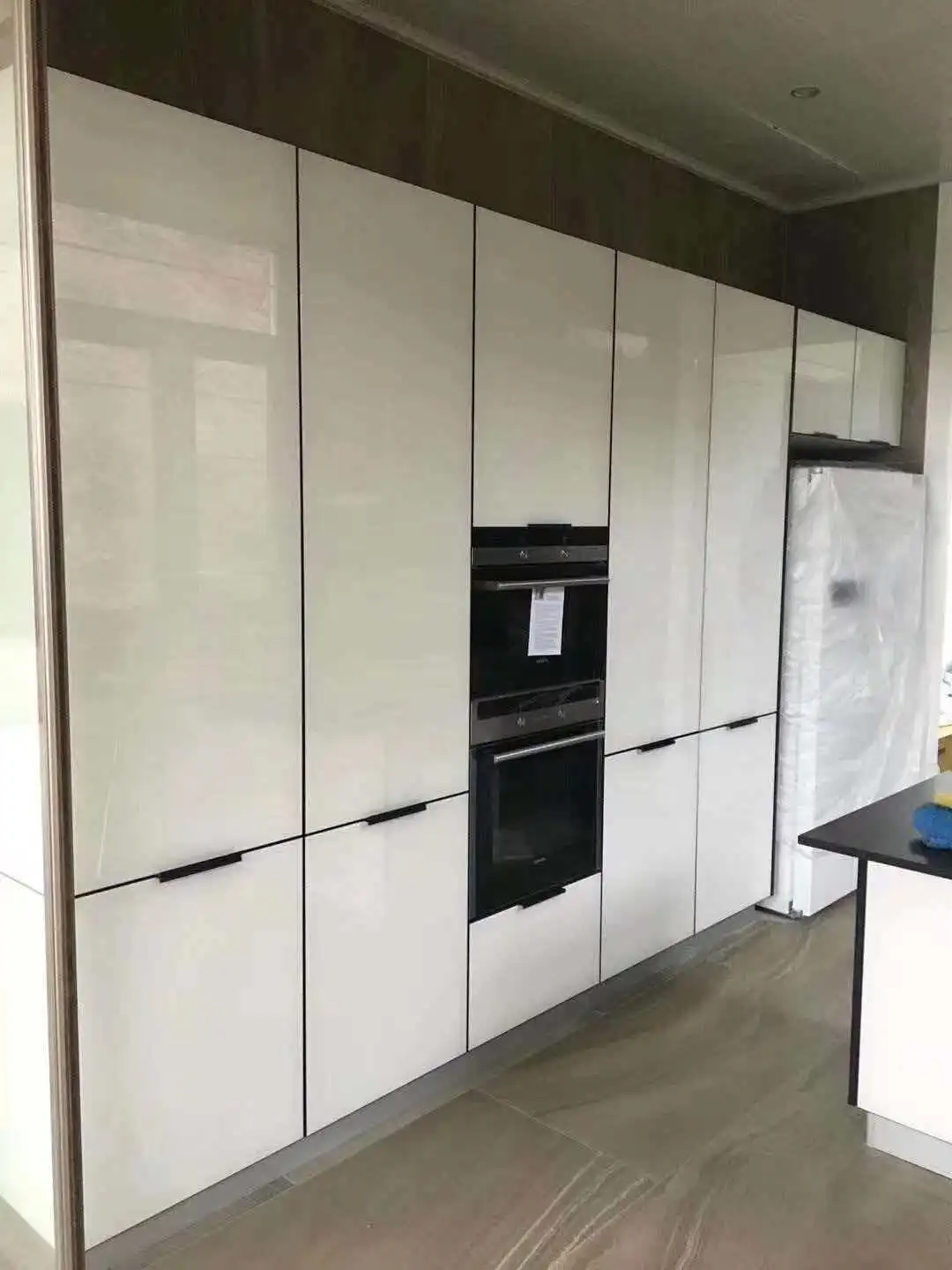 Matte PET vs. High-Gloss PET: Which Finish Wins for Modern Cabinetry?