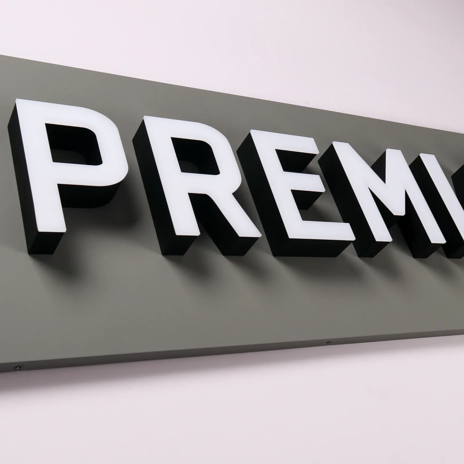 Custom Front-Lit Illuminated Channel Letters | Stainless Steel with Acrylic Face Back Plate