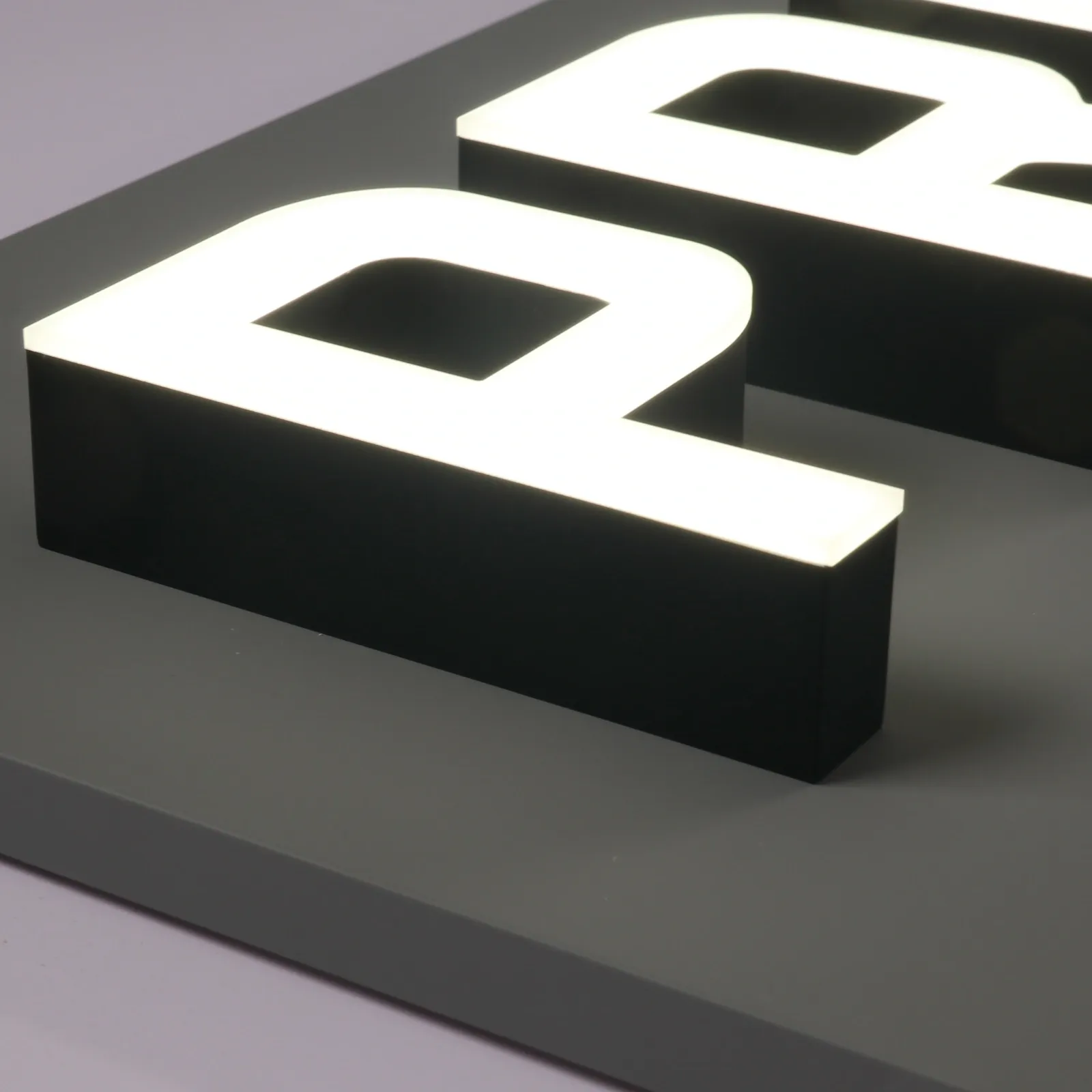 Custom Front-Lit Illuminated Channel Letters | Stainless Steel with Acrylic Face Back Plate