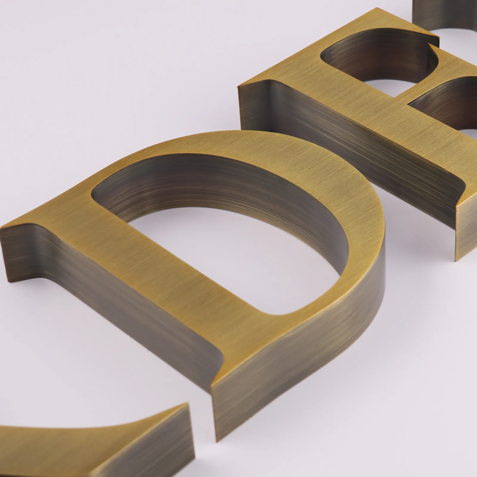 Custom Brushed Antique Brass 3D Stainless Steel Channel Letters (Non-Illuminated)