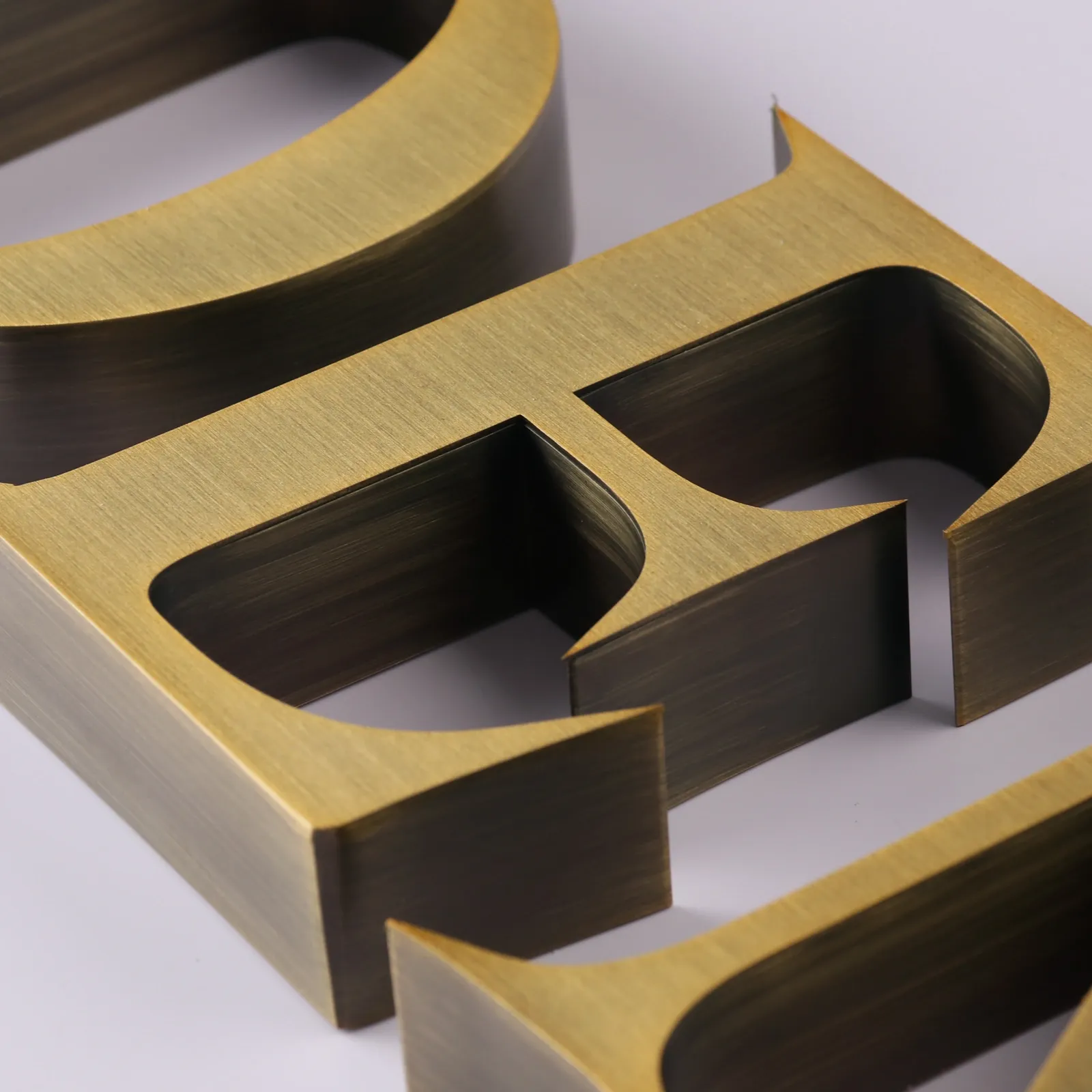 Custom Brushed Antique Brass 3D Stainless Steel Channel Letters (Non-Illuminated)