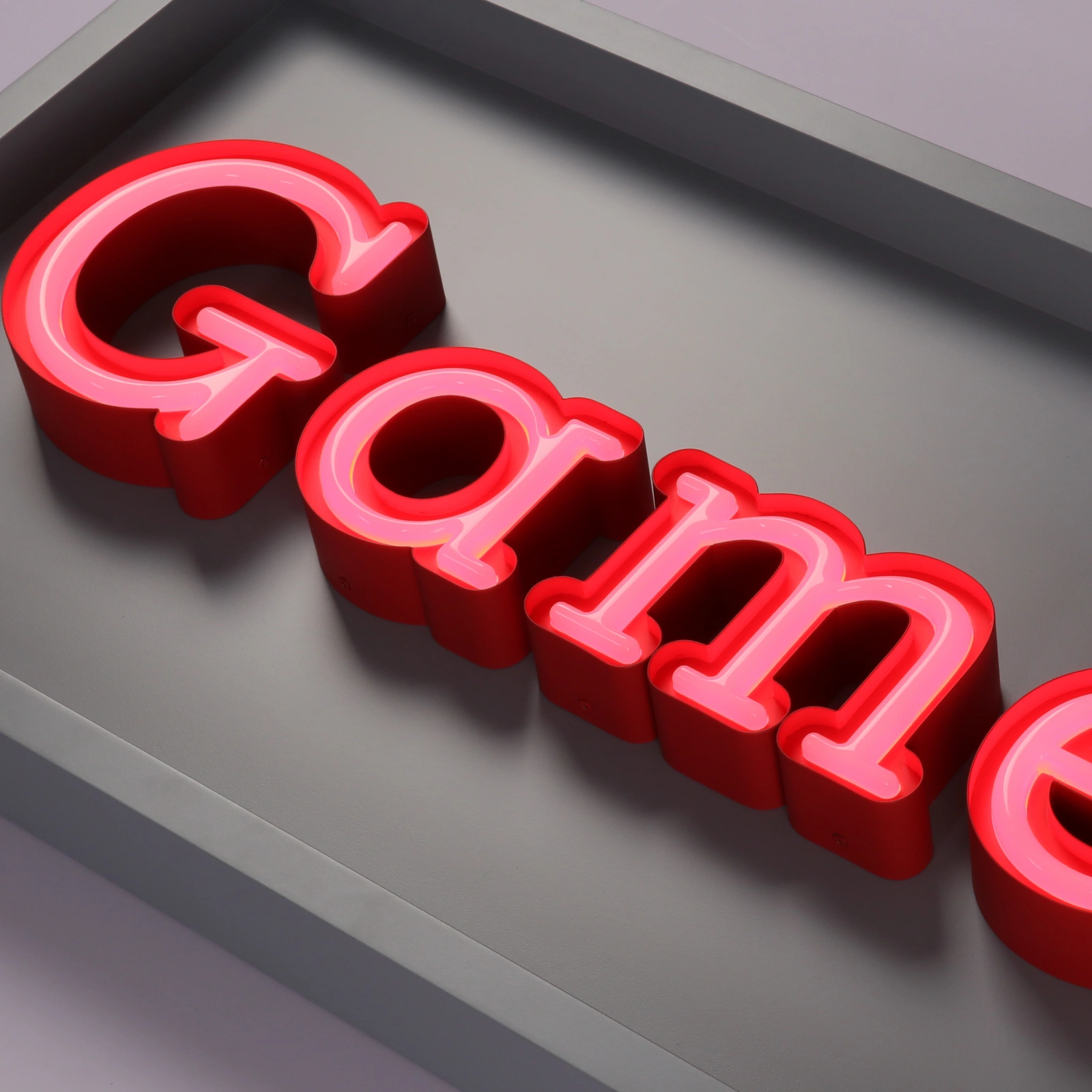 recessed-inset-acrylic-neon-style-letters-closeup.webp