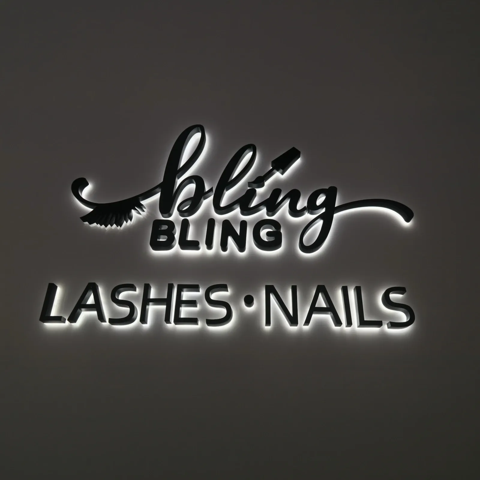 Custom Wall Mounted Backlit Channel Letters | Halo Lit Stainless Steel Sign