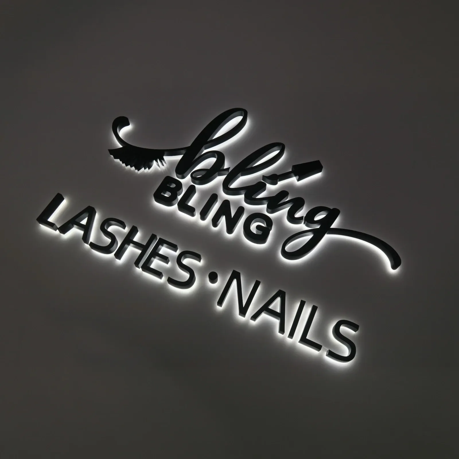 Custom Wall Mounted Backlit Channel Letters | Halo Lit Stainless Steel Sign