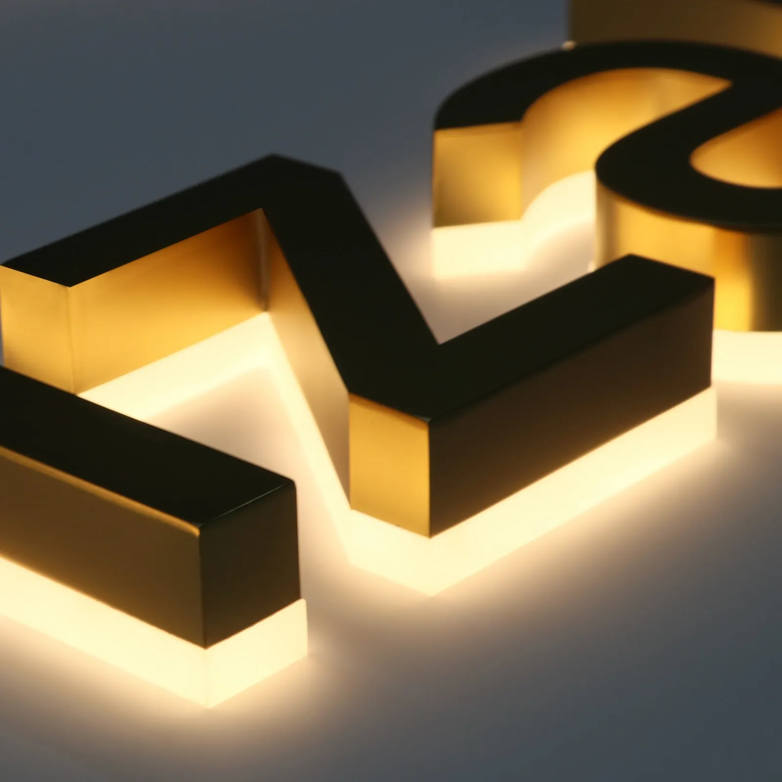 Custom Satin Titanium Gold Backlit Letters — Halo Lit Channel Sign with Frosted Clear Acrylic