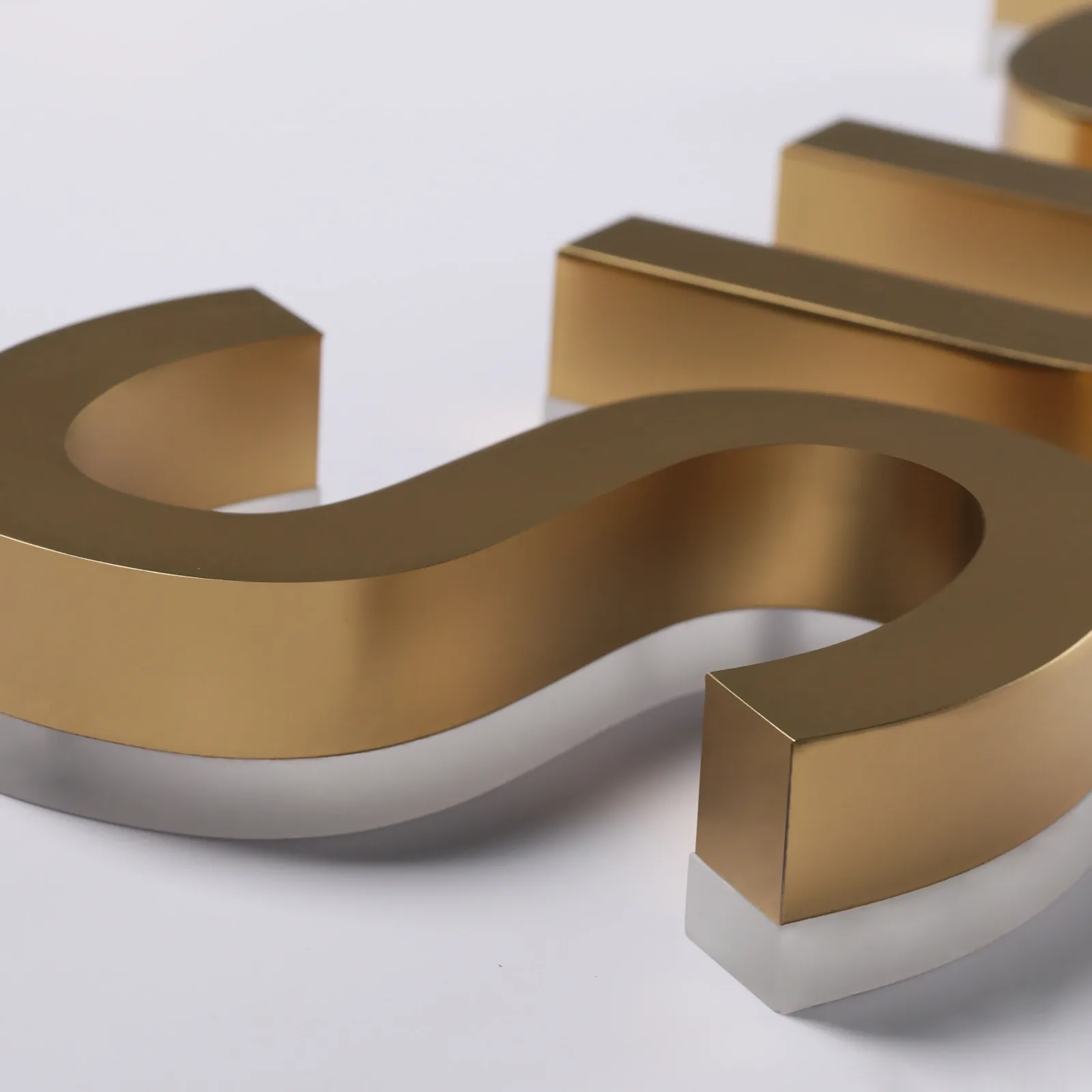 Custom Satin Titanium Gold Backlit Letters — Halo Lit Channel Sign with Frosted Clear Acrylic