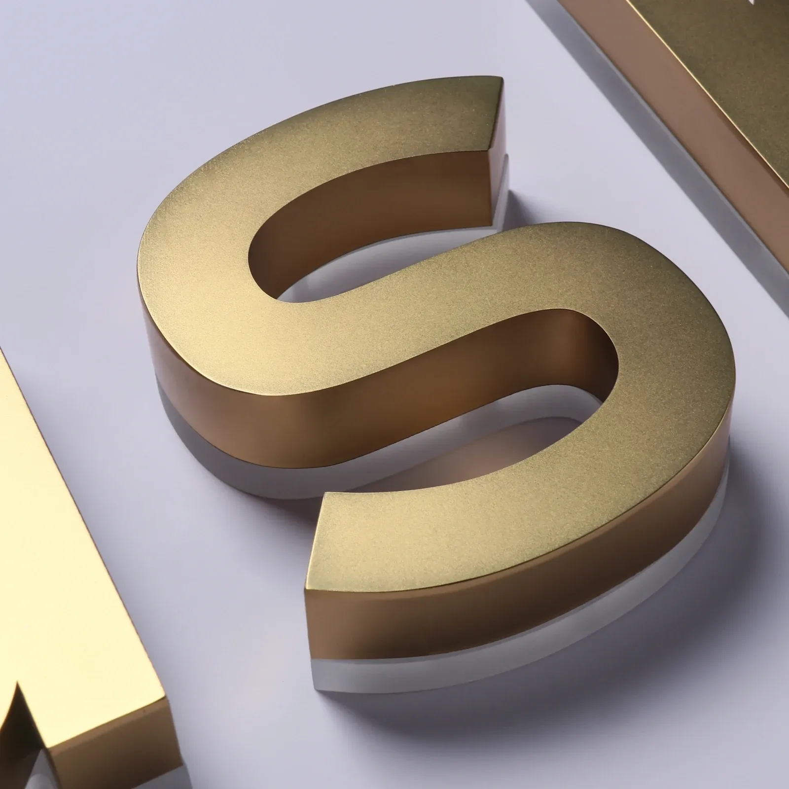 Custom Satin Titanium Gold Backlit Letters — Halo Lit Channel Sign with Frosted Clear Acrylic